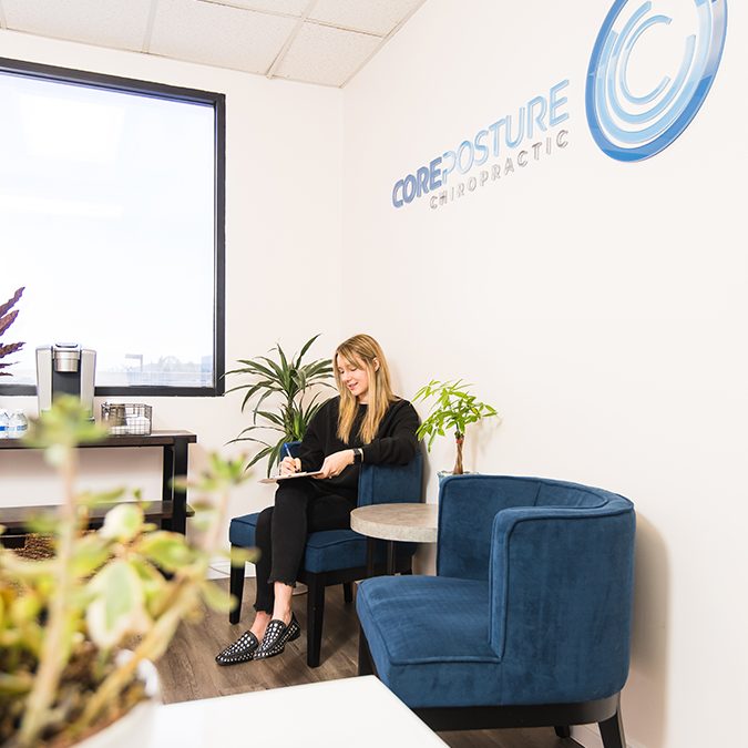 Patient-filling-out-form-waiting-room Waiting Room